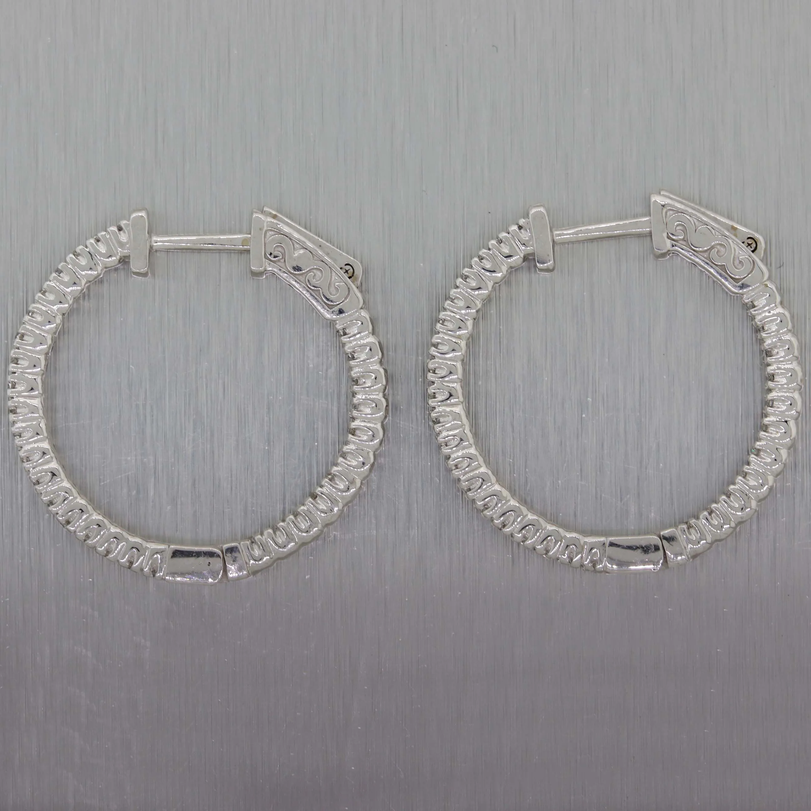Ladies 14K White Gold .71ctw Diamond 24mm In-Out Hoop Earrings
