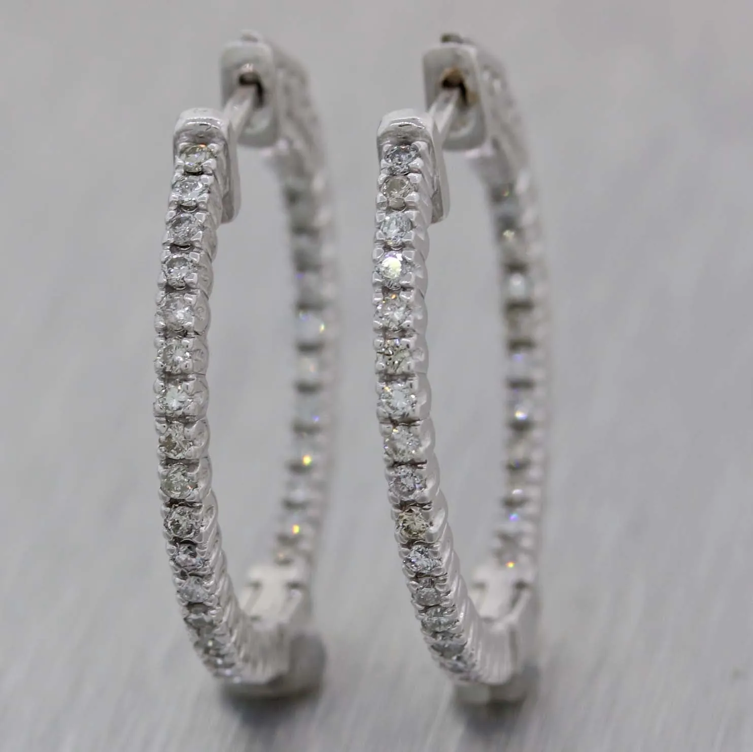 Ladies 14K White Gold .71ctw Diamond 24mm In-Out Hoop Earrings