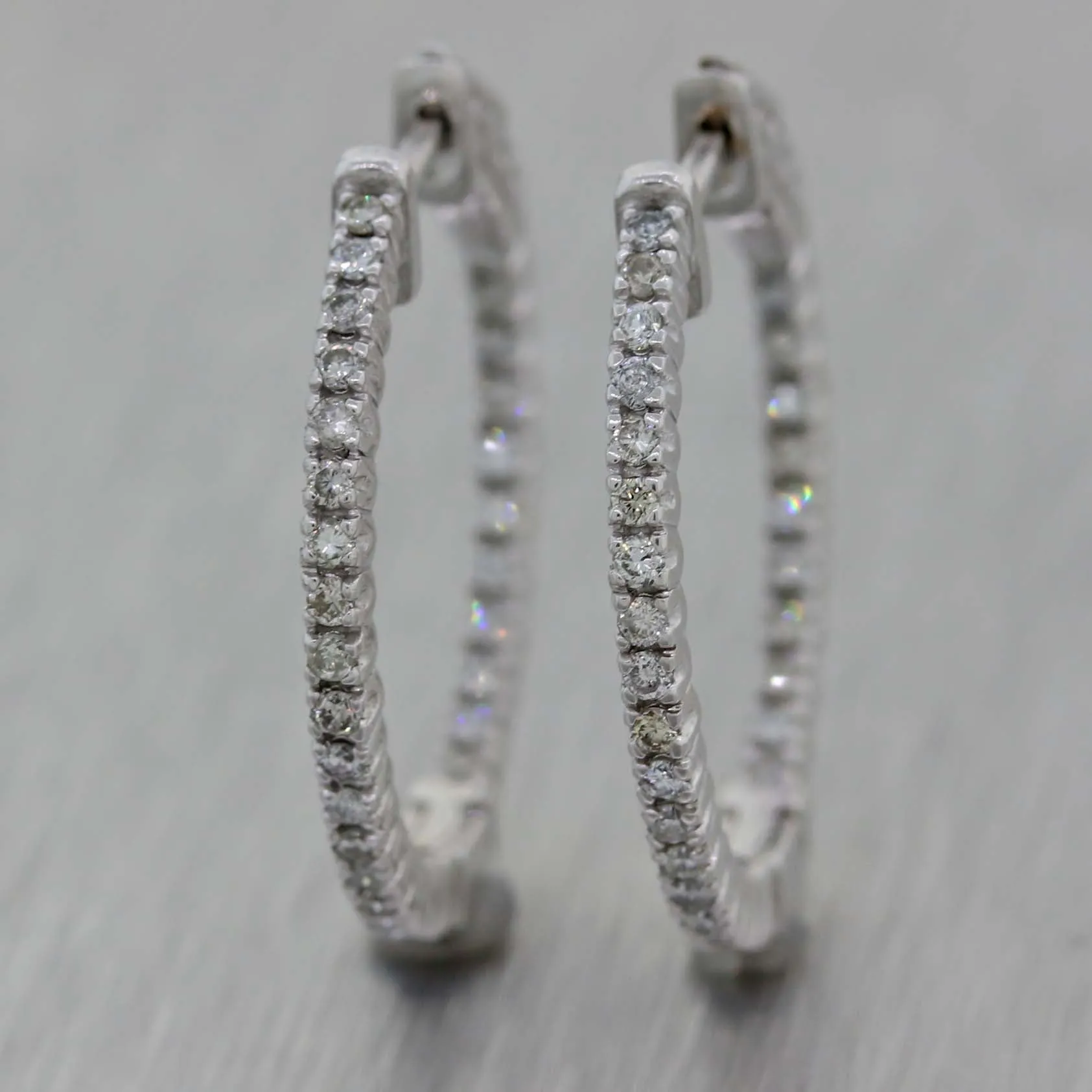 Ladies 14K White Gold .71ctw Diamond 24mm In-Out Hoop Earrings