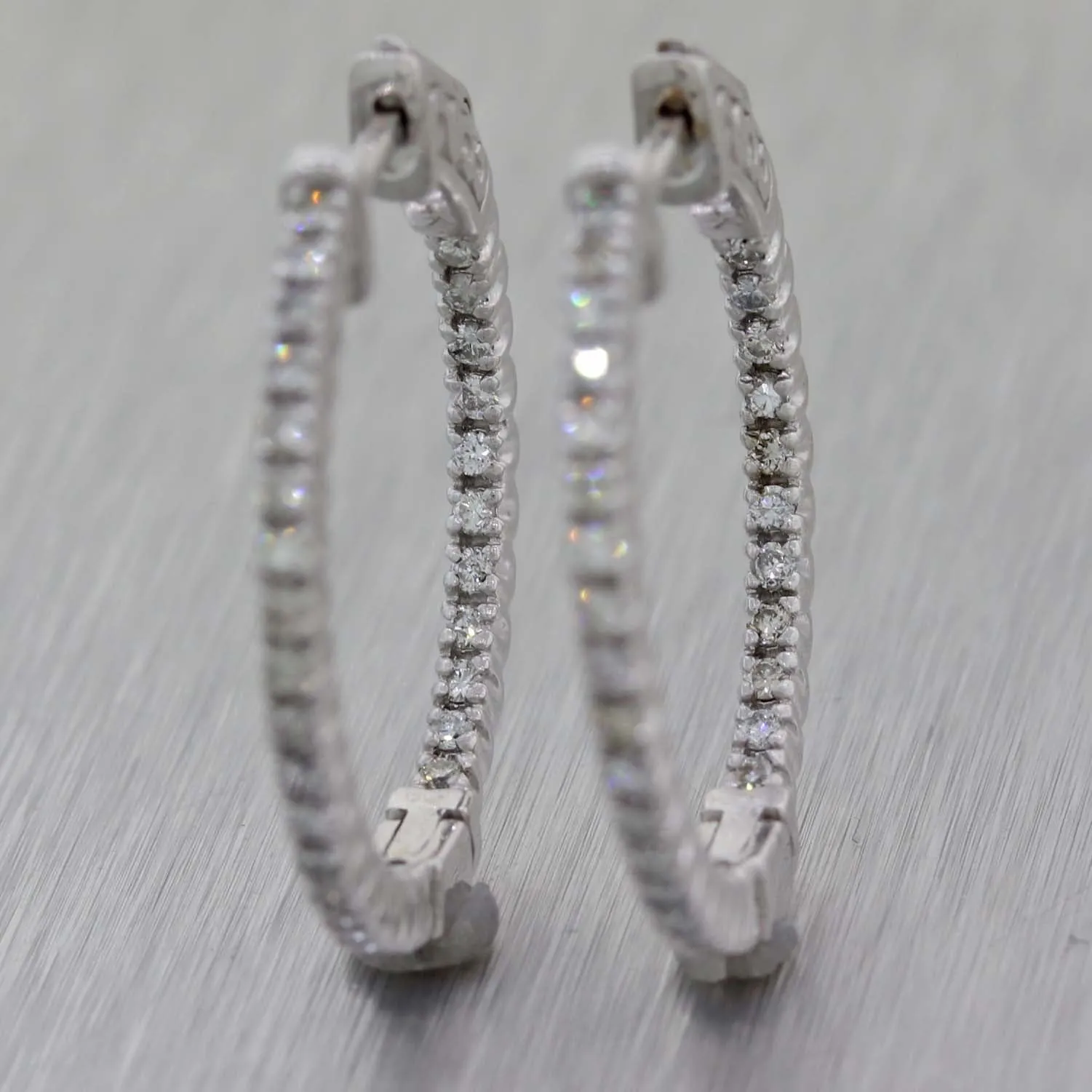 Ladies 14K White Gold .71ctw Diamond 24mm In-Out Hoop Earrings