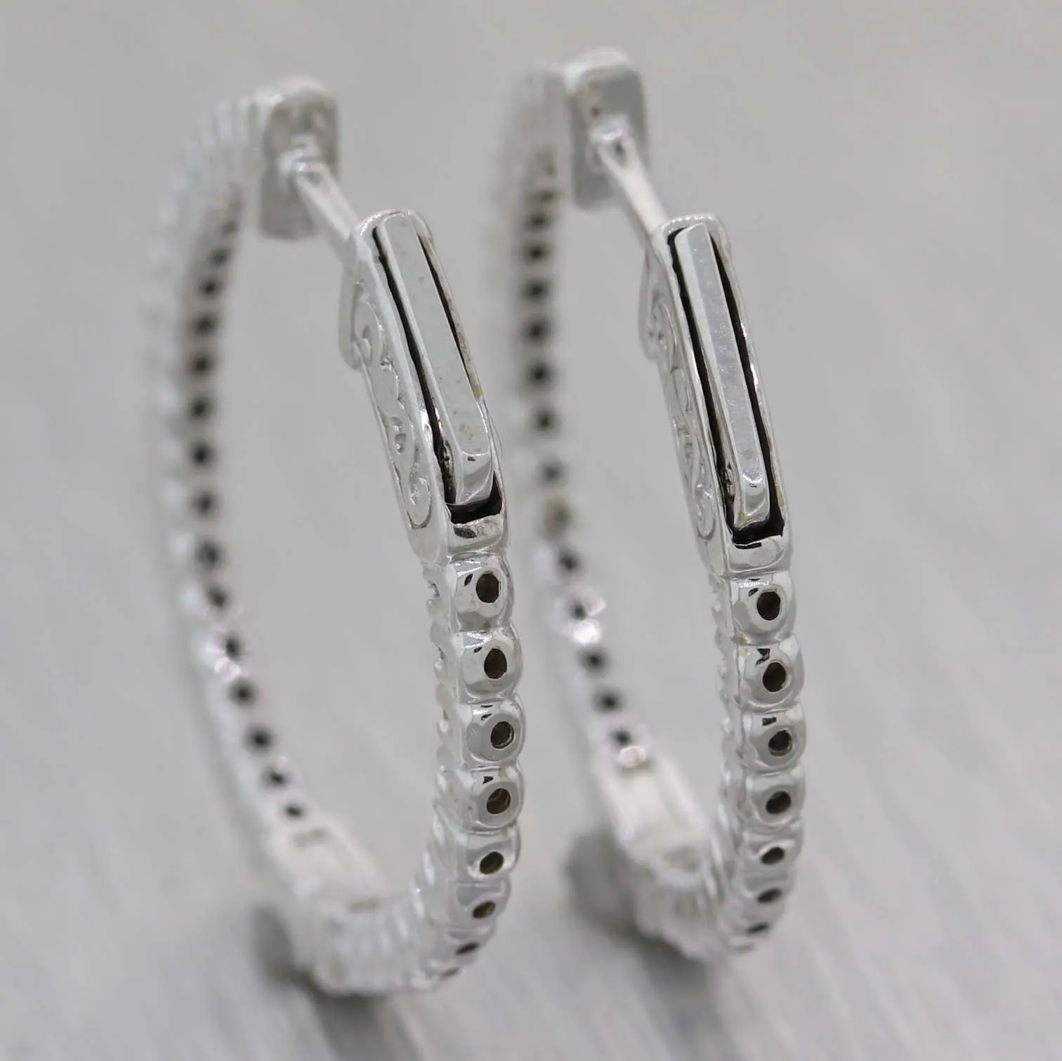 Ladies 14K White Gold .71ctw Diamond 24mm In-Out Hoop Earrings