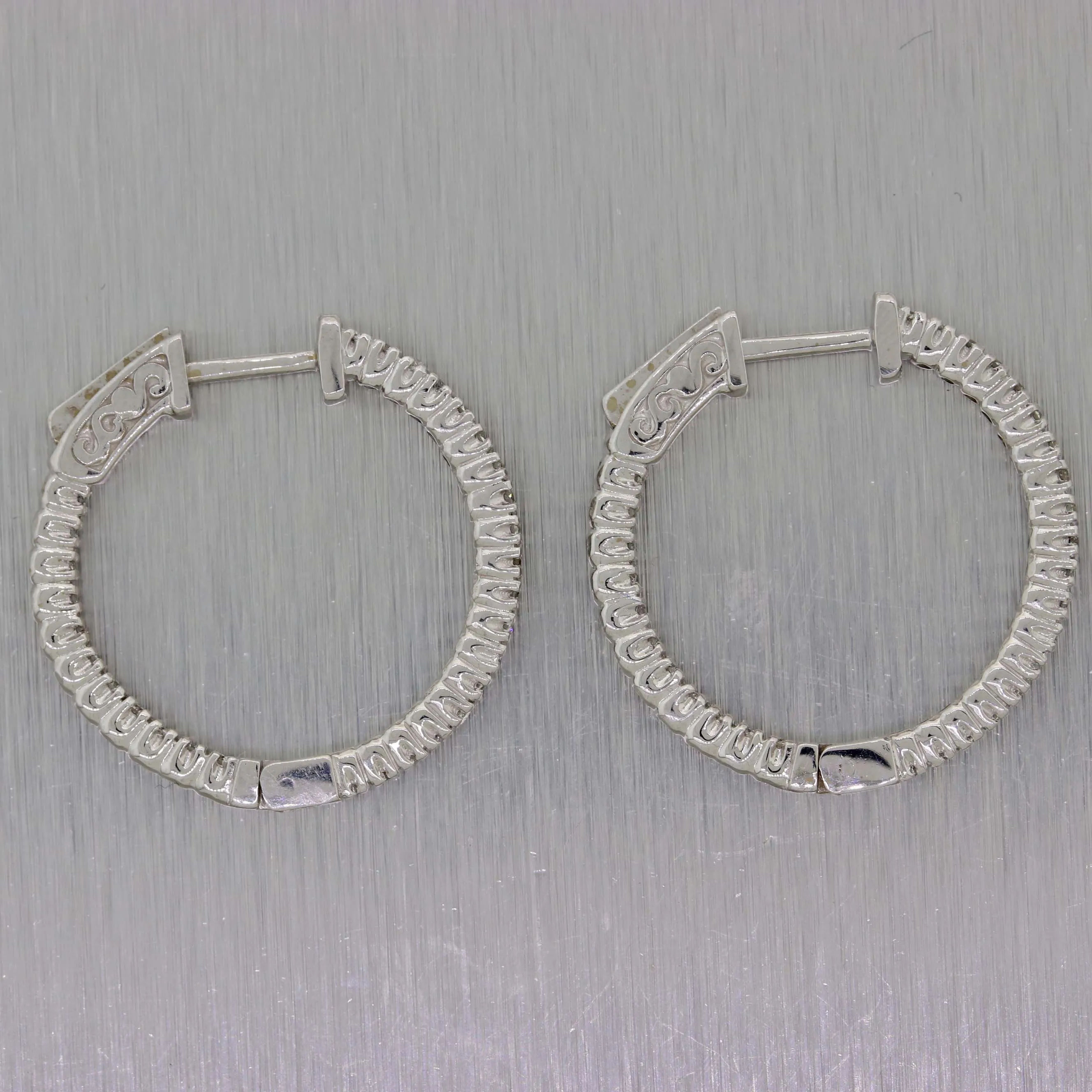 Ladies 14K White Gold .71ctw Diamond 24mm In-Out Hoop Earrings